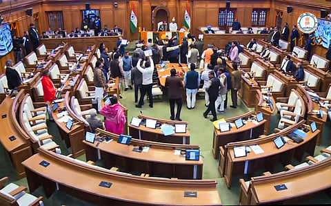 BJP MLAs protest in the well against Leader of Opposition in the Delhi Assembly Atishis alleged "insensitive words" against Guru Tegh Bahadur during Winter session of the Assembly, in New Delhi, Wednesday, Jan. 7, 2025. 