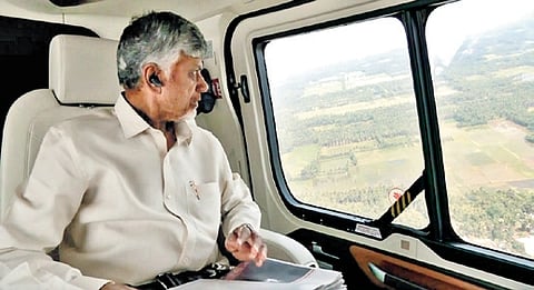 CM Nara Chandrababu Naidu conducts aerial survey over the Irusumanda blowout site in Malikipuram mandal of Ambedkar Konasema district on Friday.
