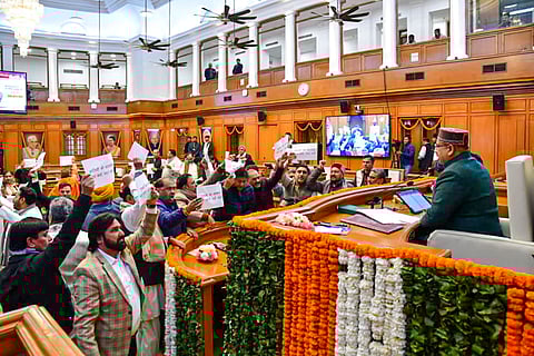 BJP MLAs protest against Leader of Opposition in the Delhi Assembly and AAP leader Atishi, demanding the cancellation of her House membership for allegedly 'disrespecting' Sikh Guru Tegh Bahadur, during the Winter session of the Assembly, in New Delhi.