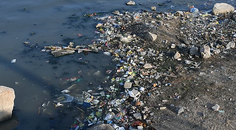 Waste accumulated on the banks of Hussain Sagar Lake.