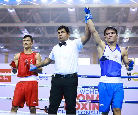 Jadumoni Singh celebrates his win on Saturday