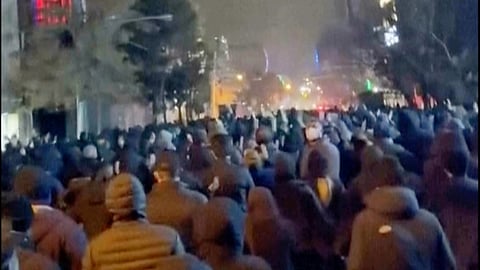 In this frame grab from footage circulating on social media from Iran shows protesters taking to the streets of Tehran despite an intensifying crackdown as the Islamic Republic remains cut off from the rest of the world in Tehran, Iran, Saturday, Jan. 10, 2026.