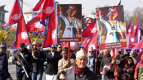 Supporters of Nepal's former royal family participate in a rally demanding the restoration of the monarchy as they mark the birth anniversary of the 18th century king Prithivi Narayan Shah, founder of the Shah dynasty, in Katmandu, Nepal, Sunday, Jan. 11, 2026.