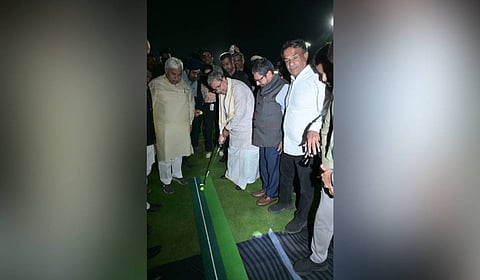 CM Siddaramaiah tries his hands at golf after inaugurating a golf club in Mangaluru on Saturday