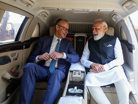 PM Modi shares car ride with German Chancellor Merz.