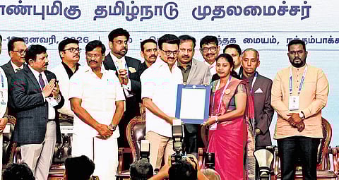 Chief Minister MK Stalin honouring members of the international Tamil community during the World Tamil Diaspora celebrations at Chennai Trade Centre.