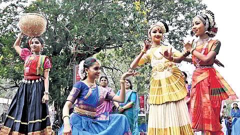 Students taking part in the procession taken out as part of the 64th State School Arts Festival in Thrissur on Tuesday.