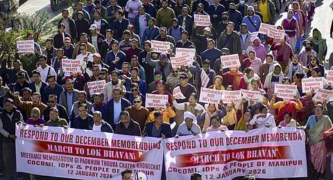Hundreds of internally displaced people stage a protest rally demanding a response from Manipur Governor Ajay Kumar Bhalla on their resettlement, in Imphal, Monday, Jan. 12, 2026.