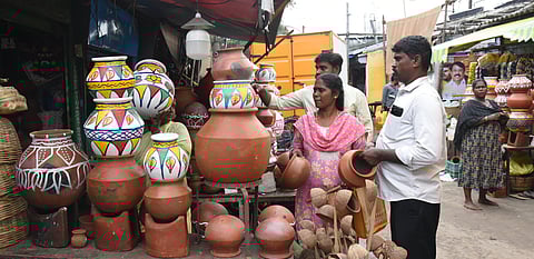 People buying earthen pots in Tiruchy on Tuesday.