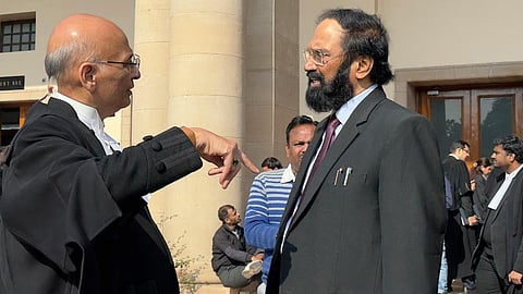 Telangana irrigation Minister Uttam Kumar Reddy in discussion with Supreme Court senior counsel , Abhishek Singhvi, outside the in Supreme Court regarding the case filed by Telangana government against the Polavaram- Nallamallasagar irrigation project of AP government.