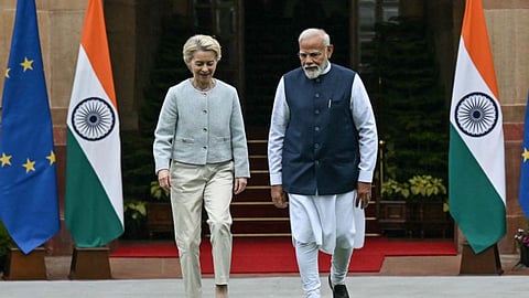 European Commission President Ursula von der Leyen (L) and India's Prime Minister Narendra Modi arrive for their meeting at the Hyderabad House in New Delhi on February 28, 2025. 