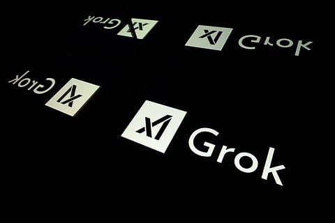 This photograph shows screens displaying the logo of Grok, a generative artificial intelligence chatbot developed by US artificial intelligence company xAI, in Toulouse, southern France, on January 15, 2025.
