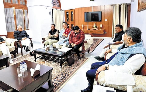 Deputy Chief Minister DK Shivakumar (extreme right) holds a preparatory meeting for the Assam Assembly elections, in New Delhi on Friday.