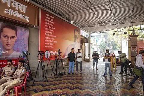 Security and media personnel outside Shiv Sena Bhavan (Shiv Sena UBT) during the counting of votes for the Maharashtra civic polls in Mumbai, Maharashtra, Friday, Jan. 16, 2026.
