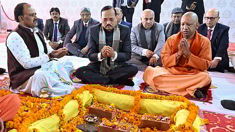 Uttar Pradesh Chief Minister Yogi Adityanath and Chief Justice of India Surya Kant during the foundation stone laying ceremony for integrated court complexes in Chandauli, Mahoba, Amethi, Shamli, Hathras, and Auraiya districts, in Chandauli, Uttar Pradesh, Saturday, Jan. 17, 2026. 