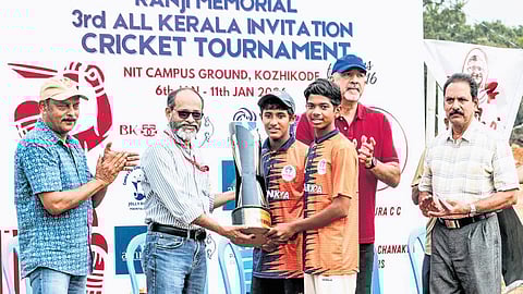 Dr Ravi Varma, Dean, NIT Calicut, presents the trophy to Prathibha Chanakya Cricket Club, the winners of the Ranji Memorial All-India Invitation Cricket Tournament.
