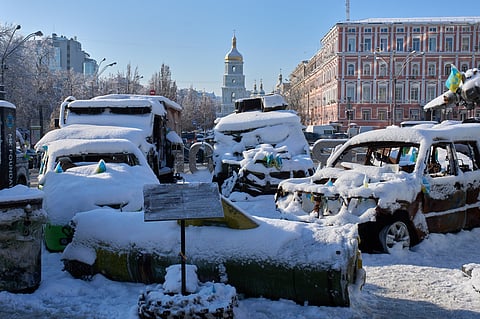 Snow covered, damaged Russian military vehicles are on display in downtown Kyiv, Ukraine, Friday, Jan. 16, 2026.