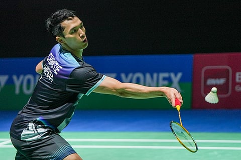 Jonatan Christie of Indonesia in action against Loh Kean Yew at the semifinals