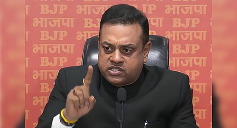 BJP national spokesperson Sambit Patra speaking to reporters at the party headquarters in Delhi.
