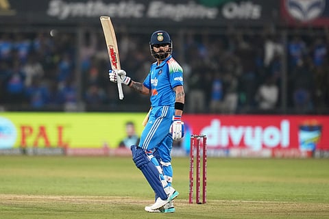 India's Virat Kohli celebrates his century during the third One Day International cricket.