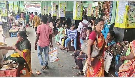 Passengers at the existing bus stand in Koraput