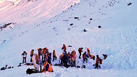 In this photo provided by the Bergrettung Pongau (Mountain Rescue Pongau), rescuers search for people after an avalanche in the Salzburg Pongau region of western Austria, Saturday, Jan. 17, 2026.