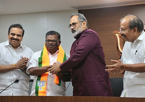 Former Devikulam MLA and CPM leader S Rajendran is welcomed into the BJP by state president Rajeev Chandrasekhar at a function held at Mararji Bhavan in Thiruvananthapuram on Sunday. Senior BJP Leaders PK Krishnadas and AN Radhakrishnan are also seen.
