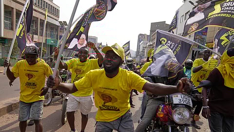 Supporters of Ugandan President Yoweri Museveni celebrate his victory in the presidential election in Kampala, Uganda, Saturday, Jan. 17, 2026.