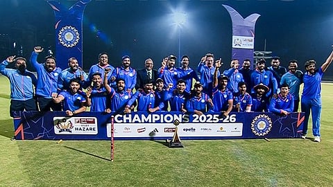 Vidarbha players pose with the Vijay Hazare Trophy title