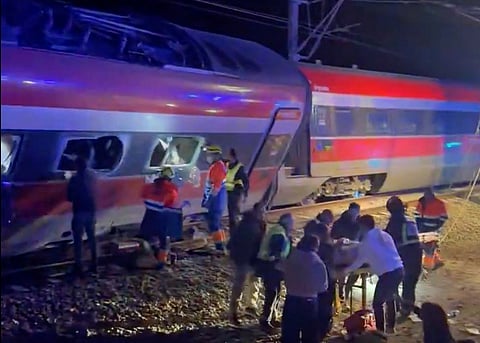 This video grab taken from UGC images posted on social media and verified by AFPTV teams in Madrid, shows emergency personnel working after a train accident in Adamuz, southern Spain, on January 18, 2026.