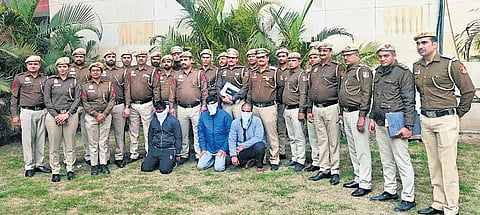 Delhi Police team with the accused in Rachna Yadav murder case on Tuesday.