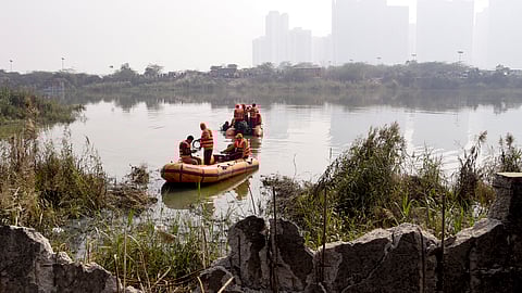 National Disaster Response Force (NDRF) team commences operations in a water-filled pit at a construction site following the death of a 27-year-old engineer who drowned there, in Noida, Tuesday, Jan. 20, 2026.