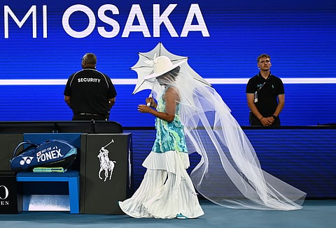 Naomi Osaka of Japan walks onto Rod Laver Arena for her first round match against Antonia Ruzic of Croatia at the Australian Open.