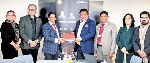 Large and Medium Industries Minister M B Patil with Shri Raju Vegesna, Chairman and Managing Director of Sify Technologies in Davos on Wednesday.