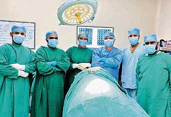 Doctors with the patient after the successful surgery | Express