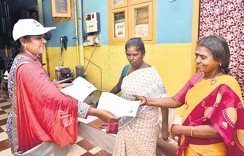 BLOs distributing SIR forms in Chennai during the enumeration phase.