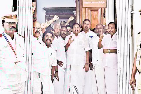 AIADMK MLAs, led by general secretary Edappadi K Palaniswami, staging a walkout against the allegedly deteriorating L&O in TN 