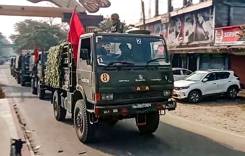 Indian Army personnel during a flag march through sensitive areas to maintain law and order following recent communal clashes that allegedly claimed two lives, in Kokrajhar, Assam, Wednesday, Jan. 21, 2026.