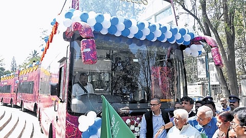 Tourism Minister H K Patil flags off double-decker buses as part of KSTDC’s Ambaari hop-on hop-off services at Ravindra Kalakshetra on Wednesday 