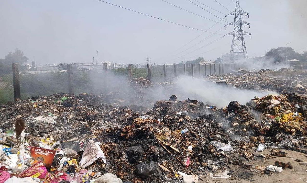 Farmers urge Tiruppur corporation to stop dumping, burning garbage on ...