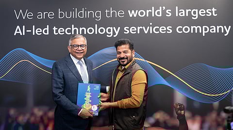 Chief Minister A Revanth Reddy presents a copy of the Telangana Rising 2047 vision document to Tata Group chairman Natarajan Chandrasekaran at Davos on Wednesday.