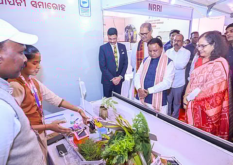 CM Majhi and deputy CM KV Singh Deo going round the stalls at the state-level Pani Panchayat Fortnight-2026 