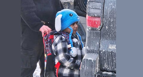 Liam Conejo Ramos, 5, is detained by U.S. Immigration and Customs Enforcement officers after arriving home from preschool, Tuesday, Jan. 20, 2026, in a Minneapolis suburb. 