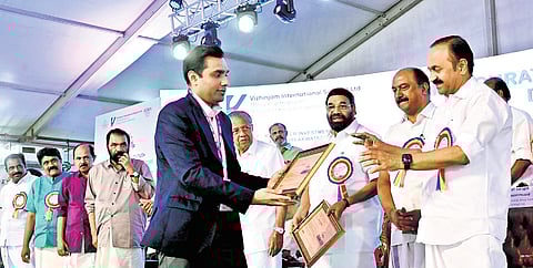 Adani Ports and SEZ MD Karan Adani presenting a memento to Leader of Opposition V D Satheesan at the inauguration of the phase-II work of the Vizhinjam International Seaport in Thiruvanathapuram on Saturday. Chief Minister Pinarayi Vijayan, and Ministers V N Vasavan and K N Balagopal are also seen 