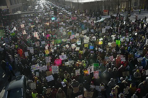 People protest against Federal immigration agents on Friday, Jan. 23, 2026, in Minneapolis. 