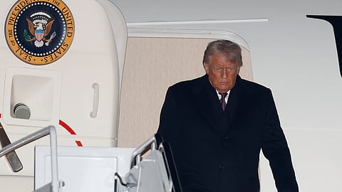 US President Donald Trump arrives on Air Force One at Joint Base Andrews, Md., Thursday, Jan. 22, 2026, after returning from the World Economic Forum in Davos.
