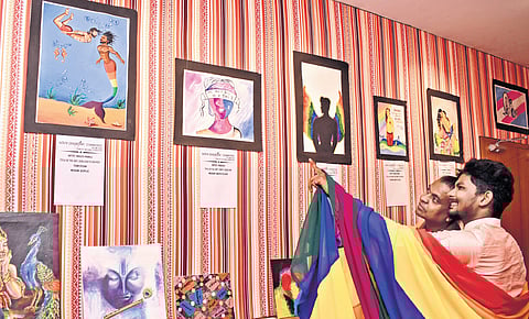 TD Sivakumar (inset) views artworks by the members of LGBTQIA+ community at an exhibition in Coimbatore