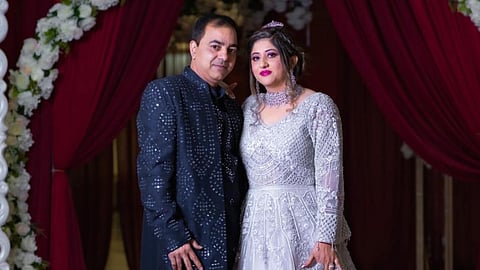 File photo of Vijay Kumar (left) and Meenu Dogra. Police say Kumar has been charged in connection with a domestic shooting in Georgia in which Dogra was among four victims.