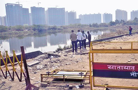 The Noida techie’s car plunged into this water-filled pit at a sharp 90-degree turn in Sector 150 while returning from office amid dense fog, reducing visibility to near zero.