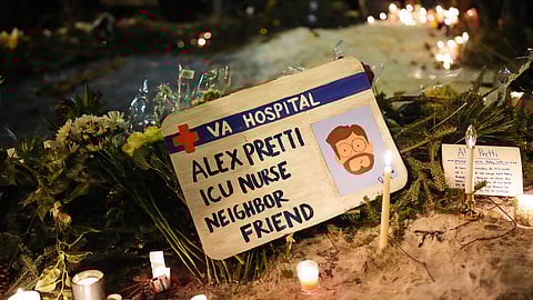 A sign for 37-year-old Alex Pretti, who was fatally shot by a US Border Patrol officer earlier in the day, is displayed during a vigil Saturday, Jan. 24, 2026, in Minneapolis.